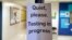 This file photo shows a sign posted while a test is being given to high school students. Many colleges switched to test-optional admissions during the pandemic. (AP Photo/Alex Brandon)