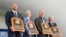 New inductees, from left, Derek Jeter, Donald Fehr (accepting for the late Marvin Miller), Larry Walker and Ted Simmons are pictured Sept. 8, 2021, at the National Baseball Hall of Fame in Cooperstown, N.Y. 