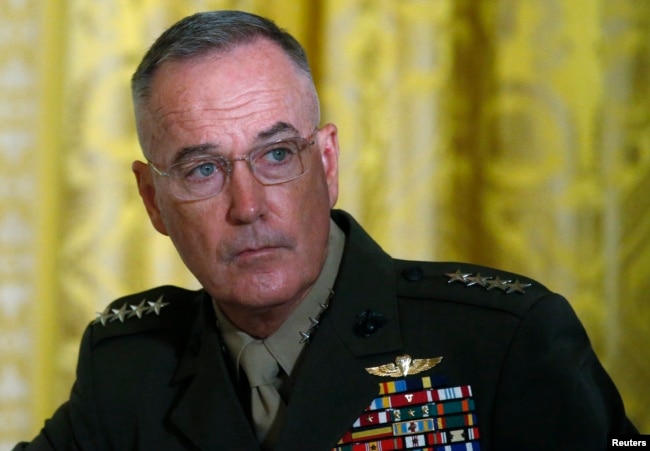 FILE - U.S. Joint Chiefs Chairman General Joseph Dunford attends a meeting of the National Space Council in the East Room of the White House in Washington, June 18, 2018.