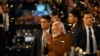 Indian Prime Minister Narendra Modi, center, greets supporters and workers as he arrives at the Bharatiya Janata Party headquarters to celebrate his party's win in Delhi state elections in New Delhi, India, on Feb. 8, 2025.