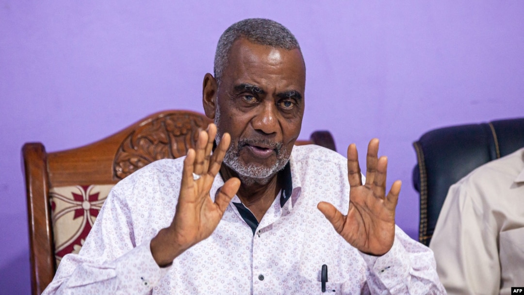 FILE - Seif Sharif Hamad, the leader of the opposition, gives a press conference at The Alliance for Change and Transparency (ACT) head office in Stone Town, Zanzibar, Oct. 27, 2020.