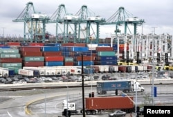 FILE - Containers are seen at the port in San Pedro, California, U.S., March 22, 2018.