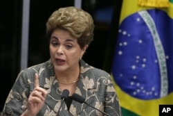 Brazil Political Crisis: Brazil's suspended President Dilma Rousseff speaks at her own impeachment trial, in Brasilia, Brazil, Monday, Aug. 29, 2016.