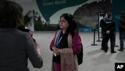 Chandni Raina, part of India's negotiating team, speaks to the media outside a closing plenary session at the COP29 U.N. Climate Summit in Baku, Azerbaijan, Nov. 24, 2024. The $300 billion that will go to developing nations each year amounts to "a paltry sum," she said. 