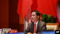 FILE - Vietnamese Trade Minister Tran Tuan Anh speaks during an online ASEAN ministerial meeting in Hanoi, Vietnam, June 4, 2020.