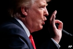 Republican presidential candidate Donald Trump speaks at a campaign rally in Bangor, Maine, Oct. 15, 2016.