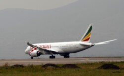 FILE - Ethiopian Airliner 787 Dreamliner prepare to take off from Addis Ababa, April 27, 2013.