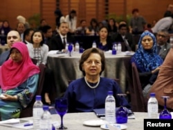 FILE - Malaysia's Bank Negara Governor Zeti Akhtar Aziz attends an Islamic Finance Services Board event in Kuala Lumpur, Malaysia, Jan. 28, 2016.