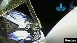 Pemandangan saat wahana Tianwen-1 memasuki orbit Mars dalam tangkapan layar ini diperoleh dari sebuah video pada 12 Februari 2021. (Foto: Reuters)