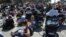 Hundreds of women promote public breastfeeding outside City Hall Square, Copenhagen, June 17, 2013.
