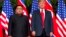 Кім Чен Ин (л) і Дональд Трамп