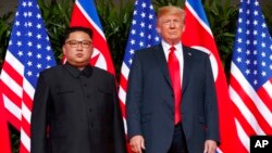 Президент США Дональд Трамп и северокорейский лидер Ким Чен Ын (архивное фото)