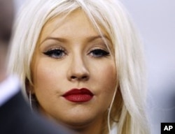 Christina Aguilera before singing the National Anthem at Superbowl XLV, February 6, 2011