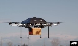 Foto yang dirilis Amazon pada 1 Desember 2013 menunjukkan drone yang akan digunakan untuk mengirim paket ukuran kecil ke para pelanggan.