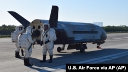 This image provided by the U.S. Air Force shows the Air Force's X-37B spacecraft at NASA's Kennedy Space Center Shuttle Landing Facility in Cape Canaveral, Fla., Sunday, May 7, 2017. U.S. military officials say that the an unmanned spacecraft orbiting Ear