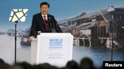 FILE - China's President Xi Jinping speaks during the opening ceremony of the 2nd annual World Internet Conference in Wuzhen town of Jiaxing, Zhejiang province, China, Dec. 16, 2015.