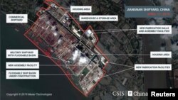 美國“戰略與國際研究中心”(CSIS)提供給路透社2019年4月17日的衛星照片顯示上海江南造船廠內一處建造平台上的船隻建造項目 