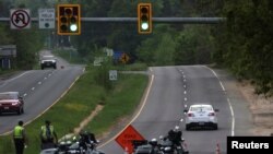 Dolley Madison Boulevard is blocked off by law enforcement in response to a security-related situation outside of the secure perimeter near the main gate of CIA headquarters in McLean, Virginia, May 3, 2021. 