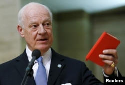FILE - U.N. mediator for Syria Staffan de Mistura delivers a statement after the opening of the Syrian peace talks at the United Nations European headquarters in Geneva, Switzerland, Jan. 29, 2016.