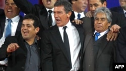 Actor Antonio Banderas, center, is pictured with Alex Vega, right, and Mario Gomez, two of the 33 workers trapped in a Chilean mine in 2010, at a preview of "The 33" in Santiago, Chile, August 2, 2015.