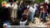In this image taken from OBN video, the coffin carrying Ethiopia singer Hachalu Hundessa is lowered into the ground during the funeral in Ambo, Ethiopia, July 2, 2020. 