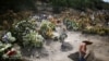 A cemetery worker dig a new grave at the Xico cemetery on the outskirts of Mexico City, as the coronavirus disease (COVID-19) outbreak continues, June 10, 2020.