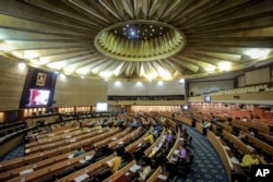 FILE - Members of the National Legislative Assembly meet at parliament in Bangkok, Thailand, Jan. 25, 2018 photo.