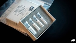 This undated photo provided by U.S. Centers for Disease Control and Prevention shows CDC’s laboratory test kit for the new coronavirus. 