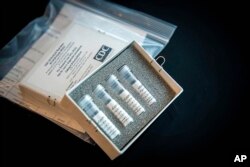 This undated photo provided by U.S. Centers for Disease Control and Prevention shows CDC’s laboratory test kit for the new coronavirus.