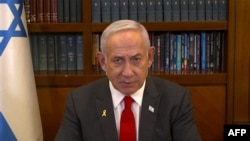 FILE - This image grab from handout video footage released by the Israeli Government Press Office (GPO) shows Prime Minister Benjamin Netanyahu giving a televised address in Jerusalem on Jan. 18, 2025. 