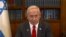 FILE - This image grab from handout video footage released by the Israeli Government Press Office (GPO) shows Prime Minister Benjamin Netanyahu giving a televised address in Jerusalem on Jan. 18, 2025. 