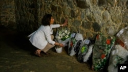 FILE: U.S. Vice President Kamala Harris lays a wreath at Cape Coast Castle in Ghana, Tuesday March 28, 2023. This castle served as an embarkation point for slaves en route to the Americas. Harris is on a seven-day African visit that will also take her to Tanzania and Zambia. 