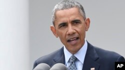 FILE - President Barack Obama speaks in the Rose Garden of the White House in Washington.