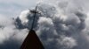 FILE - A cross is seen atop a church steeple in Indonesia's North Sumatra province, Nov. 30, 2013. Three churches on Indonesia's Sumatra Island were sealed by authorities Thursday.