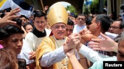 Managua's Bishop Silvio Baez greets faithful during a resurrection mass in Esquipulas, April 21, 2019. 