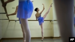 Harper Ortlieb, from Mount Hood, Oregon, performs in a ballet class at the Bolshoi Ballet Academy in Moscow, Russia, March 3, 2016.
