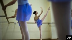 Harper Ortlieb, from Mount Hood, Oregon, performs in a ballet class at the Bolshoi Ballet Academy in Moscow, Russia, March 3, 2016.