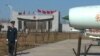 A Chinese airman stands at attention during an Air Force show at Yangcun Air Base.