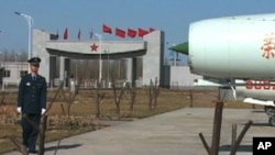 A Chinese airman stands at attention during an Air Force show at Yangcun Air Base.