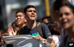 University students protest against President Nicolas Maduro in Caracas, Venezuela, Nov. 3, 2016.