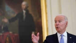 President Joe Biden responds to a question after announcing from the White House in Washington, July 29, 2021, that millions of federal workers must show proof they've received a coronavirus vaccine or submit to regular testing and masking.