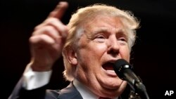 Republican presidential candidate Donald Trump gestures during a rally in Charleston, W.Va., May 5, 2016. 