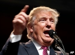 Republican presidential candidate Donald Trump gestures during a rally in Charleston, W.Va., May 5, 2016.