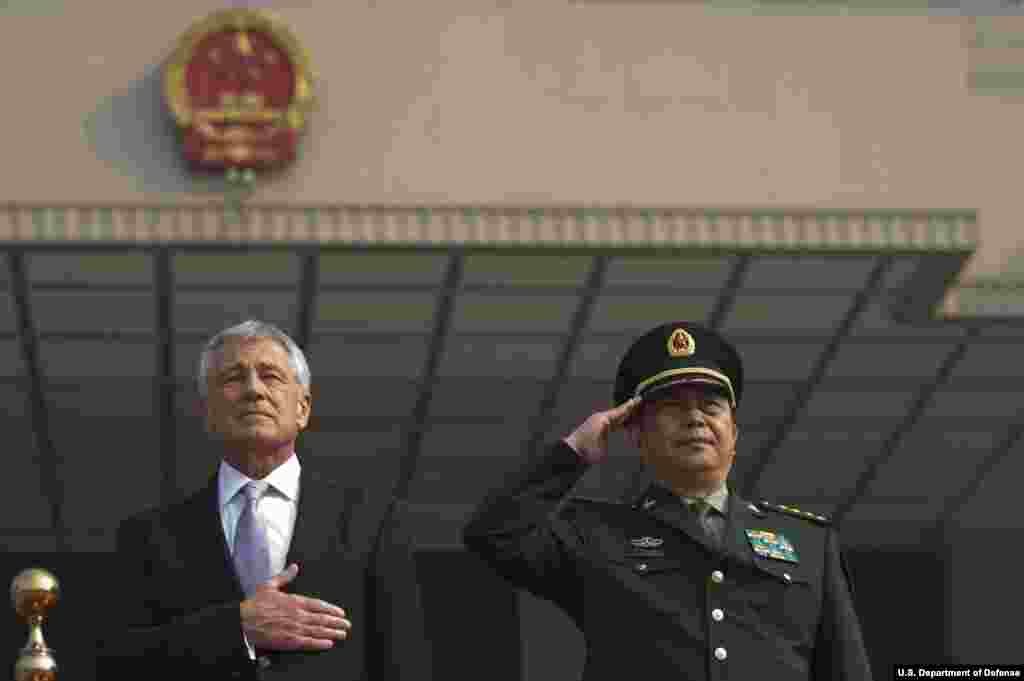 Secretary of Defense Chuck Hagel stands with Chinese Minister of Defense Chang Wanquan at an honors ceremony in Beijing, China April 8, 2014. (Department of Defense)