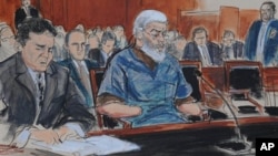In this courtroom drawing, defense attorney, Jeremy Schneider (L) represents accused terrorist Abu Hamza al Masri (C) in Manhattan federal court in New York, October 9, 2012.