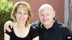 Rep. Gabrielle Giffords, Giffords is with her husband, NASA astronaut Mark Kelly (file photo)
