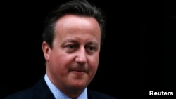 FILE - Britain's Prime Minister David Cameron leaves No. 10 Downing Street in London, Britain.