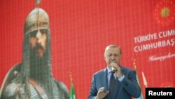 Turkish President Tayyip Erdogan makes a speech during a ceremony in the eastern city of Mus, Turkey August 26, 2018. 