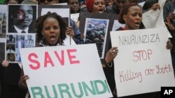 FILE - Burundi nationals from across the U.S. and Canada, along with supporters, demonstrate outside U.N. headquarters in New York, calling for an end to political atrocities and human rights violations unfolding in Burundi under the government of President Pierre Nkurunziza, April 26, 2016.