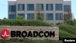 FILE - A sign to the campus offices of chipmaker Broadcom Ltd is shown in Irvine, California, Nov. 6, 2017. 